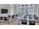 Bright community classroom with large windows and ample desk space for residents to gather at 10519 Spring Tide Way, Parrish, FL 34219