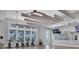 Well-lit exercise room with modern stationary bikes and ceiling fans for a comfortable workout at 10519 Spring Tide Way, Parrish, FL 34219