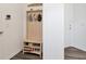 Mud room provides convenient coat rack, bench and storage space at 10519 Spring Tide Way, Parrish, FL 34219