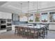 Community kitchen with modern appliances, ample counter space, and seating around a center island at 10519 Spring Tide Way, Parrish, FL 34219