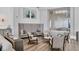 Inviting lounge area with plush seating, accent lighting, and stylish decor at 10519 Spring Tide Way, Parrish, FL 34219
