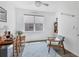 Bright office space with wood-look flooring, vintage decor and a comfortable work environment at 10519 Spring Tide Way, Parrish, FL 34219