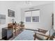 Bright office space with wood-look flooring, vintage decor and a comfortable work environment at 10519 Spring Tide Way, Parrish, FL 34219
