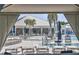 Inviting pool area with shaded lounge seating for relaxing by the water at 10519 Spring Tide Way, Parrish, FL 34219