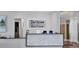 Reception area with modern design and a welcoming Del Webb BayView sign at 10519 Spring Tide Way, Parrish, FL 34219