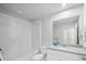 Clean bathroom featuring a shower-tub combo, white vanity with a sink, and a toilet at 11828 Sky Acres Ter, Bradenton, FL 34211