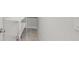 A walk in closet featuring wire shelving, neutral walls and flooring at 11828 Sky Acres Ter, Bradenton, FL 34211
