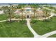 Inviting clubhouse with lush landscaping and a welcoming entrance for residents to enjoy at 11828 Sky Acres Ter, Bradenton, FL 34211