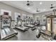 A well-equipped gym boasts modern treadmills and weight machines, perfect for a complete workout at 11828 Sky Acres Ter, Bradenton, FL 34211