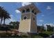 A charming decorative tower welcomes residents to the community with its unique architectural design at 11828 Sky Acres Ter, Bradenton, FL 34211