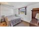 Bright bedroom with a ceiling fan, providing a comfortable space for relaxation at 1212 41St Avenue E Dr, Ellenton, FL 34222