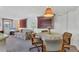 Dining area providing a seamless transition to the living room and kitchen at 1212 41St Avenue E Dr, Ellenton, FL 34222