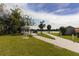 Charming gazebo overlooking the community green space and waterway, offering a peaceful spot for relaxation at 1212 41St Avenue E Dr, Ellenton, FL 34222