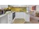 Well-organized kitchen with ample counter space and essential appliances at 1212 41St Avenue E Dr, Ellenton, FL 34222