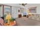 Comfortable living room featuring plush seating and a wall-mounted television at 1212 41St Avenue E Dr, Ellenton, FL 34222