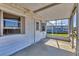 Enclosed porch with ample light and views offering relaxed outdoor living space at 1212 41St Avenue E Dr, Ellenton, FL 34222