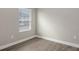 Compact bedroom with wood-look tile flooring and good natural lighting at 12520 Brookgreen St, Venice, FL 34293