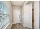 Home Foyer featuring neutral walls, wood-look tile flooring, and a bright, inviting atmosphere at 12520 Brookgreen St, Venice, FL 34293