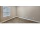 Bright room featuring a window and hardwood flooring at 12520 Brookgreen St, Venice, FL 34293