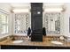 Bright bathroom features double sinks, granite counters, and decorative mirrors at 1538 S Orange Ave, Sarasota, FL 34239
