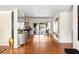 Open-concept living area with hardwood floors and sliding glass doors to the outdoor patio at 1538 S Orange Ave, Sarasota, FL 34239