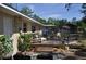 Backyard with a wooden deck, seating, and fenced-in area for outdoor enjoyment at 1711 30Th W St, Bradenton, FL 34205
