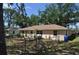 View of the backyard featuring a fenced perimeter, cozy patio with patio furniture at 1711 30Th W St, Bradenton, FL 34205