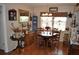 Inviting dining room with a wooden table set, chandelier, and abundant natural light at 1711 30Th W St, Bradenton, FL 34205