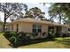 Charming single-story home features lush landscaping, creating a welcoming and attractive curb appeal at 1711 30Th W St, Bradenton, FL 34205