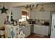 Bright kitchen featuring white cabinets, and stainless steel appliances at 1711 30Th W St, Bradenton, FL 34205