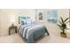 Comfortable bedroom features a bedside table and relaxing nautical decor at 1727 88Th Nw Ct, Bradenton, FL 34209