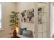 Charming entryway featuring a decorative map, stylish seating, and bright natural light at 1727 88Th Nw Ct, Bradenton, FL 34209