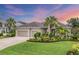 Charming single-story home with a well-manicured lawn, tropical landscaping and a two car garage at 1727 88Th Nw Ct, Bradenton, FL 34209