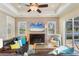 Inviting living room with pool view through large sliding glass door at 1727 88Th Nw Ct, Bradenton, FL 34209