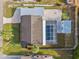 Aerial view of the property highlighting the backyard, pool, patio, and garage at 2070 Carpetgreen St, Port Charlotte, FL 33948