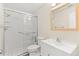 This bathroom features a walk-in shower, vanity, and updated fixtures at 2070 Carpetgreen St, Port Charlotte, FL 33948