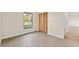 This bedroom offers lots of natural light and wood floors at 2070 Carpetgreen St, Port Charlotte, FL 33948