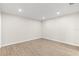 Light and airy bedroom featuring new vinyl flooring, neutral walls, and recessed lighting at 2070 Carpetgreen St, Port Charlotte, FL 33948
