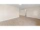 Bright living space with vinyl flooring, perfect for relaxation and entertaining, showcasing new paint at 2070 Carpetgreen St, Port Charlotte, FL 33948