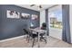Inviting home office featuring an oversized executive chair, and a well-lit desk area at 2457 Mellow Ln, Clearwater, FL 33765