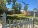 Enclosed back yard with fence and green grass at 2712 52Nd Avenue W Ter, Bradenton, FL 34207