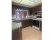View of the kitchen with a sink, oven and cabinets at 2712 52Nd Avenue W Ter, Bradenton, FL 34207