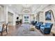 Inviting lobby area with stylish seating, elegant rugs, and tasteful decor creating a welcoming atmosphere at 27454 Hole In One Pl, Englewood, FL 34223