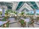 Outdoor patio featuring comfortable seating and a covered area, ideal for social gatherings at 27454 Hole In One Pl, Englewood, FL 34223