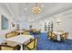Inviting restaurant dining area with elegant decor, tables and chairs at 27454 Hole In One Pl, Englewood, FL 34223