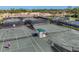 Aerial view of the tennis courts and a gazebo at Boca Royale Golf & Country Club at 27454 Hole In One Pl, Englewood, FL 34223