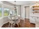 Cozy breakfast nook with large windows and stylish lighting at 30416 Saddlebag Trl, Myakka City, FL 34251