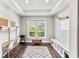 Study with shelving and natural lighting is a great place to focus at 30416 Saddlebag Trl, Myakka City, FL 34251