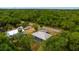 The home and property, including the garage, seen from a high angle at 3320 Audette St, Port Charlotte, FL 33948