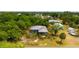 Aerial view of the home showcasing its location and surrounding lush greenery at 3320 Audette St, Port Charlotte, FL 33948